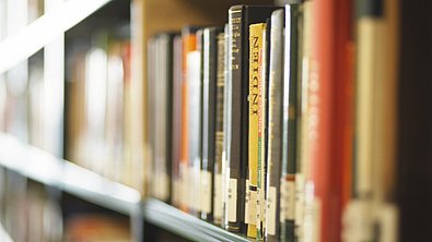 A bookshelf in the library